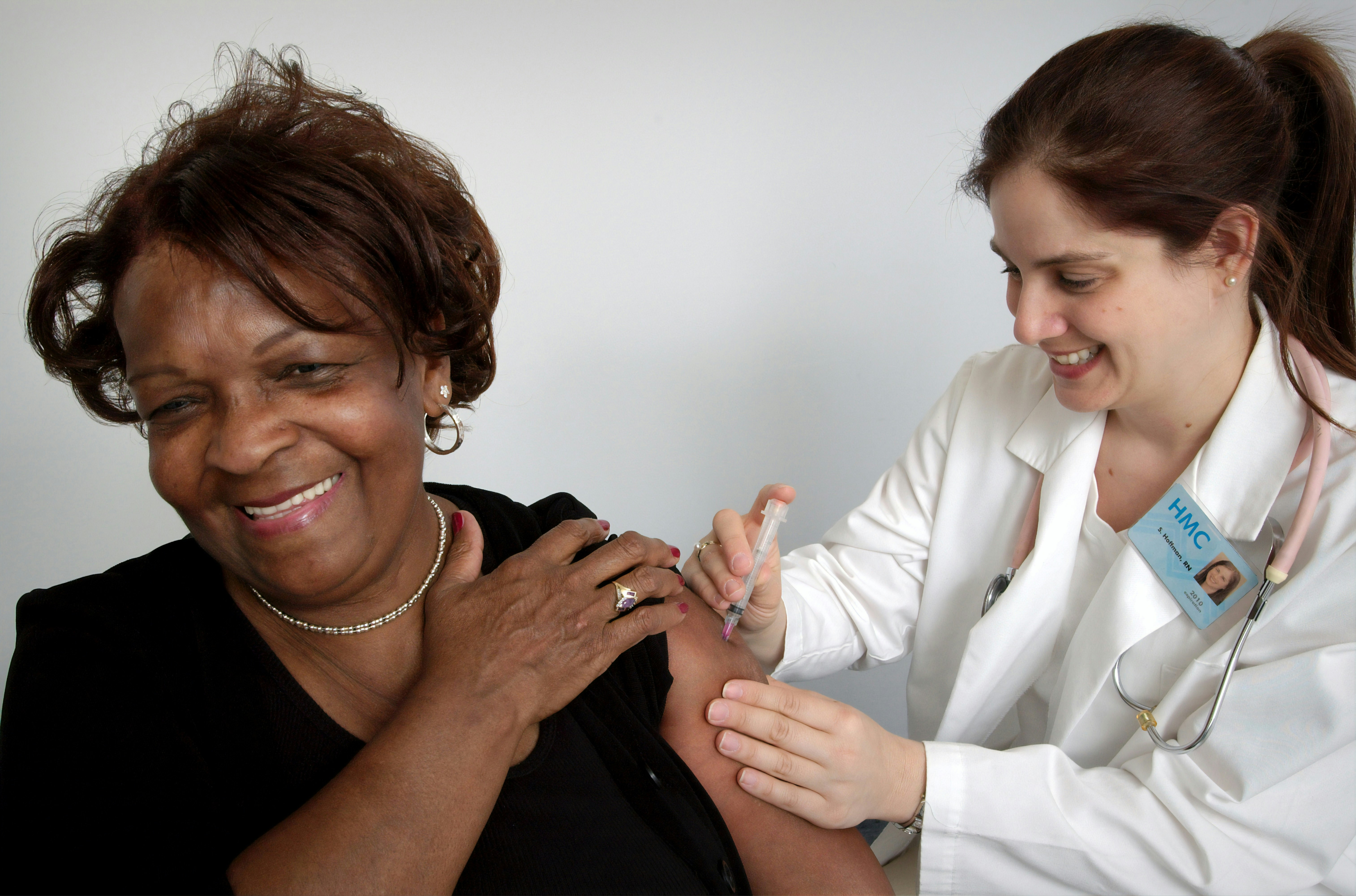 woman getting vaccine